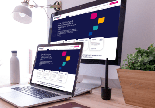 Digital screens showing the Clever Marketing website