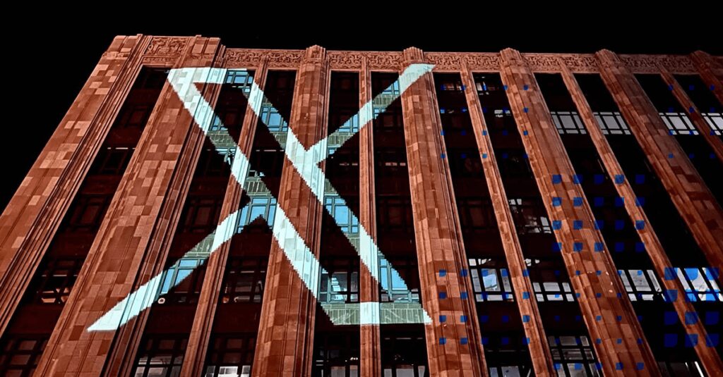 Twitter X projected on Twitter HQ.